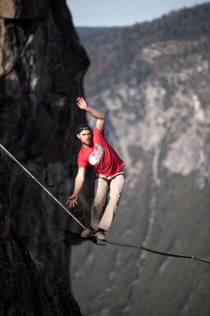 Slackliner in Red Shirt