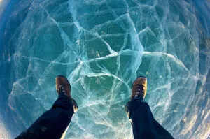 Feet hovering over water
