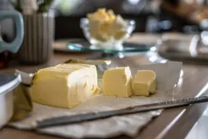 Slices of Butter on Glass Cutting Board