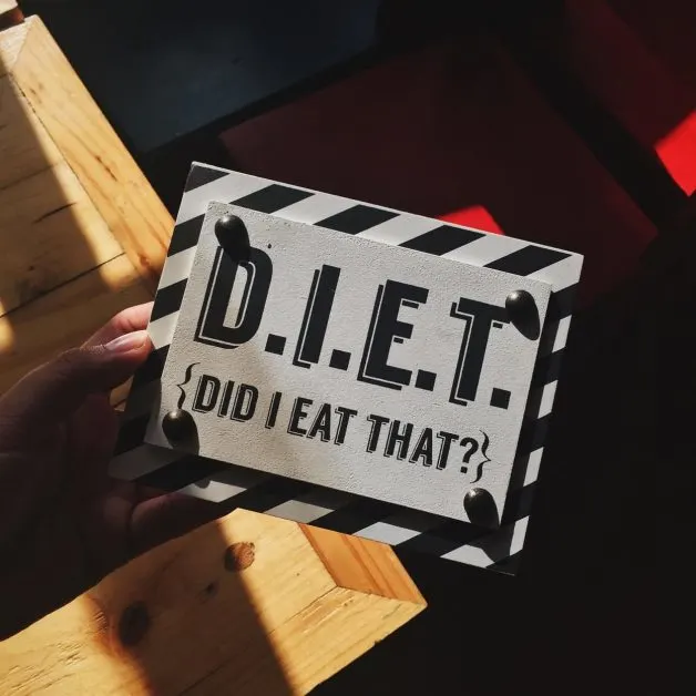 A sign that says DIET, as featured on a blog about healthy eating hacks
