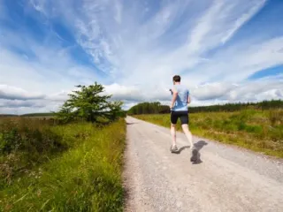 Guy Running Down Dirt Road