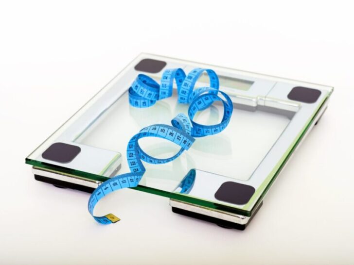 Blue Measuring Tape on Clear Square Glass Scale