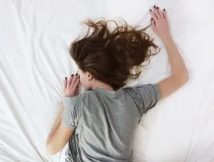 Girl Sleeping on Bed