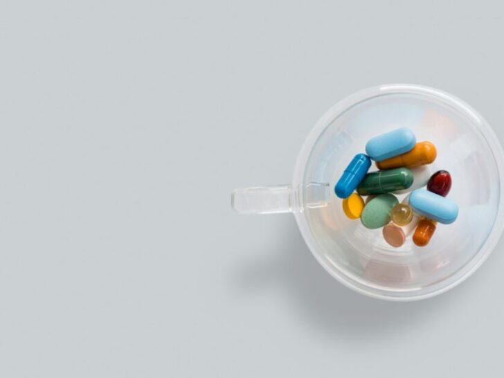 Clear Container Holding Multi Color Pills