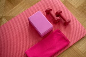 Pink Dumbbells on Pink Yoga Mat
