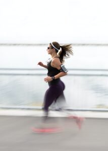 Woman Running in Blurred Photo