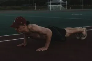 Guy Without Shirt on Doing Pushup