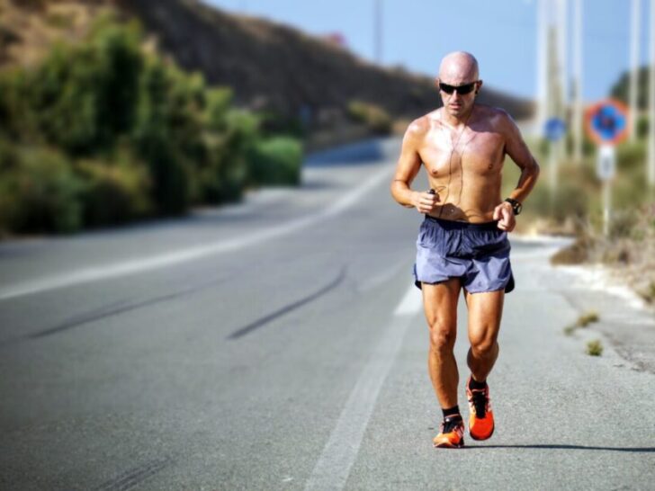 Guy Running On Road With Shirt Off