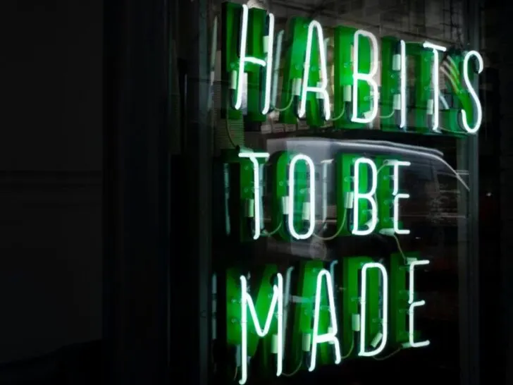 Green Neon Sign Saying Habits to be Made