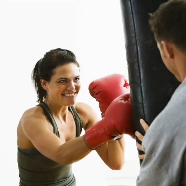 Woman wearing boxing gloves 