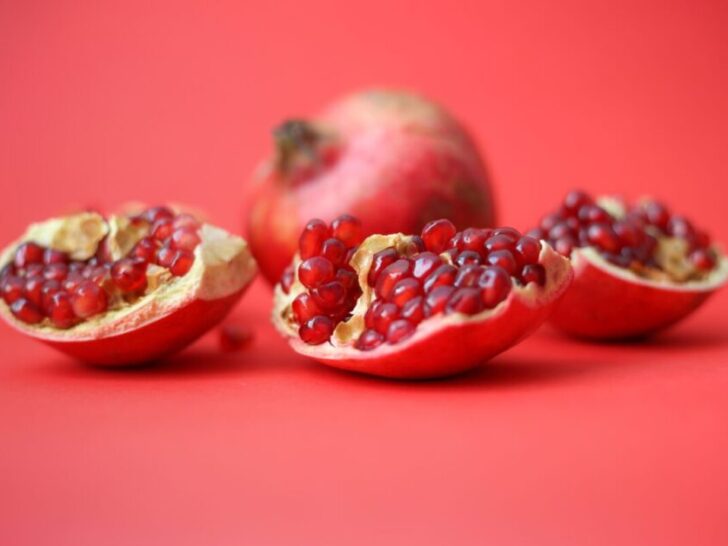 Pomegranates on a red background